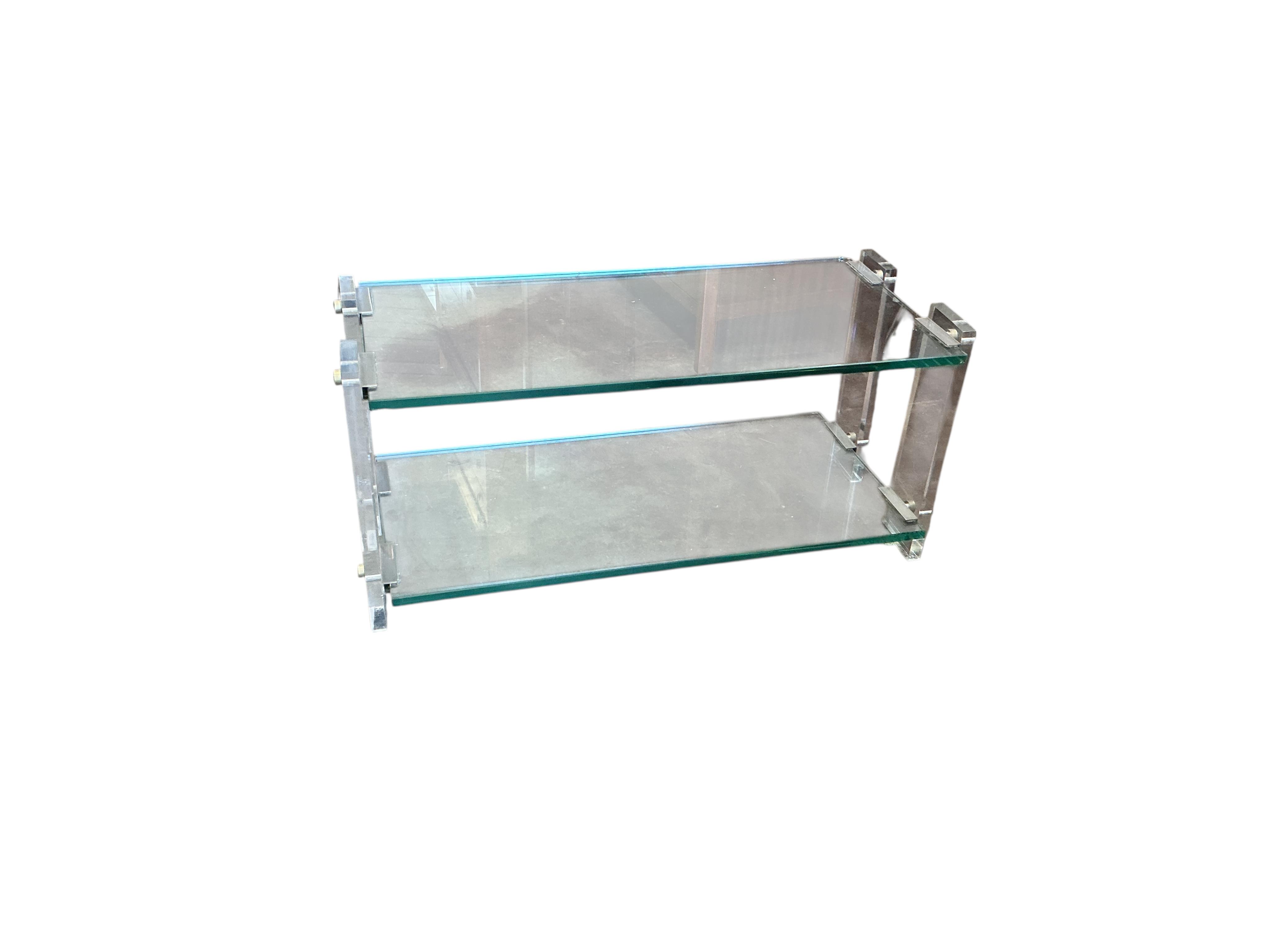 A modernist acrylic and glass two tier coffee table, width 85cm, depth 40cm, height 41cm